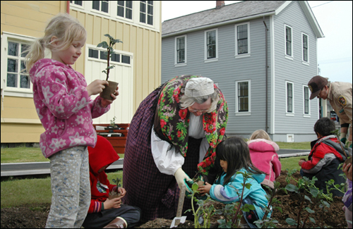 Rose helps the kindergartners plant the garden in May and return as first graders to harvest the yield.